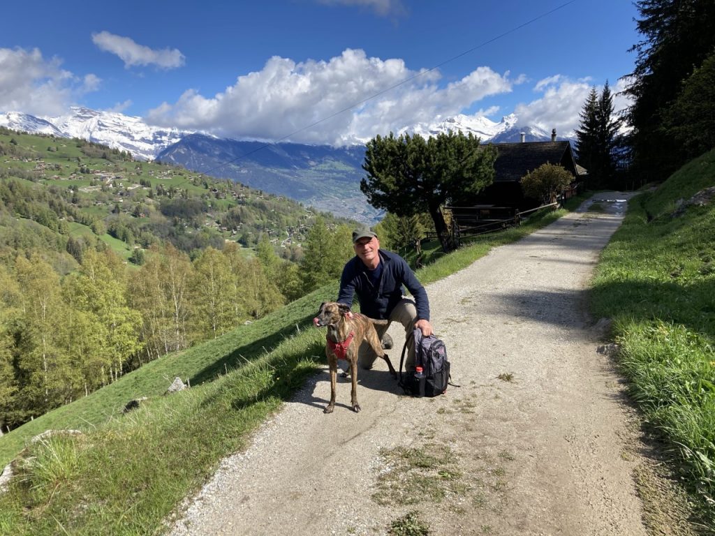 Author with host dog ‘Riga’ hiking near the Alps in southwestern Germany